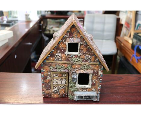 Folk Art Model of a Cottage of Wooden construction with applied decoration. 26cm in Height 