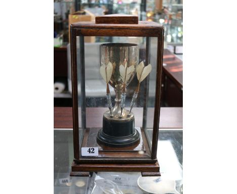 Oak and glazed Darts Presentation cup relating to the Royal Corps with 3 Feathered Darts and mounts and Newspaper cutting. 34