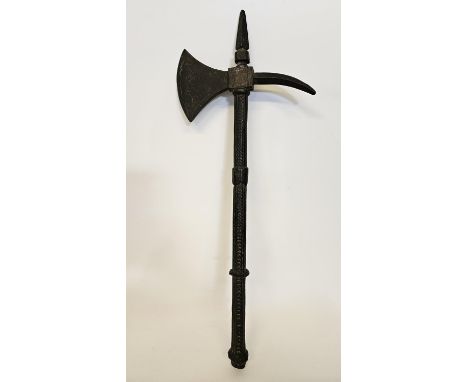 Medieval Ottoman style cast iron war axe with eastern script and figural motif to axe head. 55cm in Length 