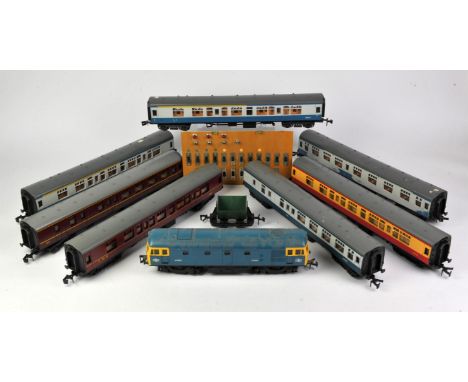 Lima models 0 gauge British rail Locomotive D6524 4-0-4 with seven carriages. Different liveries and makers.