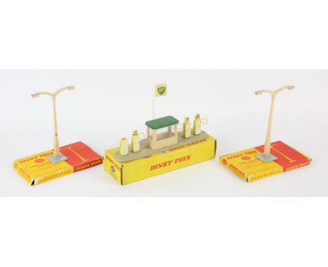 Dinky Toys 783 Petrol Pump Station 'BP'. Top of one of the pumps missing, in damaged original box. Along with x2 Dinky Toys 7