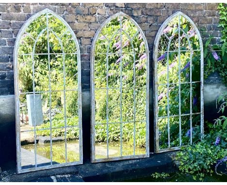 ARCHITECTURAL GARDEN MIRRORS, set of three, 160cm H x 67cm W, distressed metal frames. (3) 