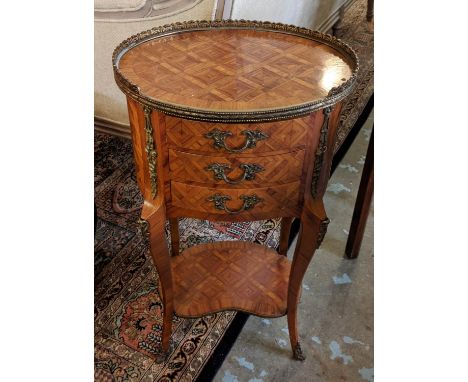 PETITE COMMODE, 40cm x 30cm x 70cm H, Transitional  style tulipwood of oval form with gilt metal mounts, parquetry detail, th