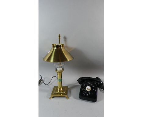 A Vintage Black Telephone and Reproduction Orient Express Brass Mounted Lamp 