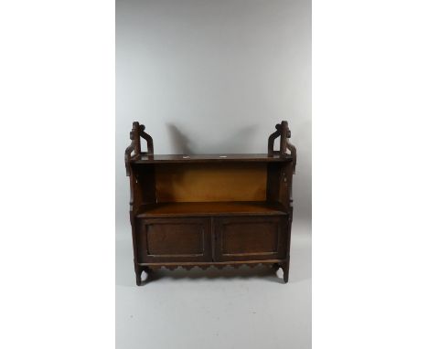 An Edwardian Oak Wall Hanging Shelf Cabinet with Pierced Supports, 61cm Wide 