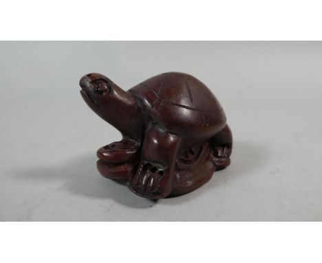 A Carved Wooden Netsuke in the Form of a Tortoise, 5cm High 