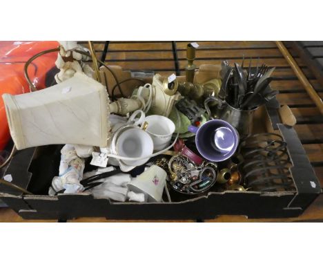 A Box of Sundries to Include Jewellery, Brass Candle Sticks, Cutlery, Toast Rack, Cabbage Leaf Dish, Figural Ornaments and Ta