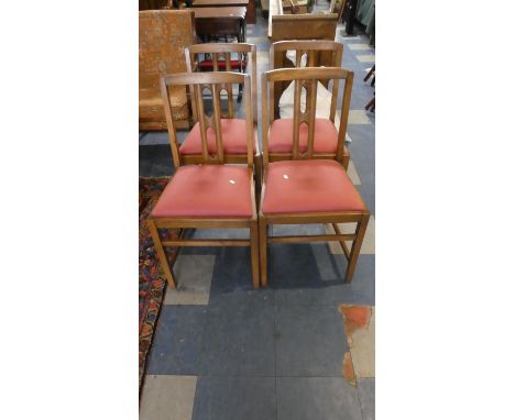 A Set of Four Ercol Dining Chairs 
