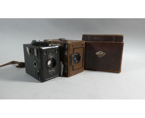 A Vintage Leather Cased Zeiss Ikon Box-tengor Camera Together with an Ensign Rapid Rectilinear Model 