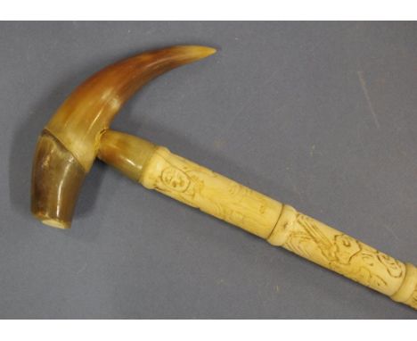 Carved bone walking stick with horn handle