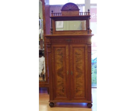 Antique French walnut cabinet with mirror back and shelf top above a drawer and 2 doors opening to inside shelves, 88cm wide,