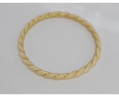 Vintage ivory bangle with twists of gold wire
