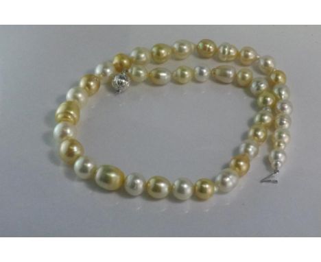 Cream and golden pearl necklace approx 49cm in length