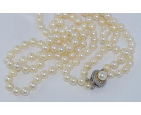Double strand pearl necklace with sterling clasp set with pearl and additional safety clasp, size: smallest length approx 58c