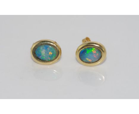 14ct gold and opal stud earrings weight: approx 1.63 grams