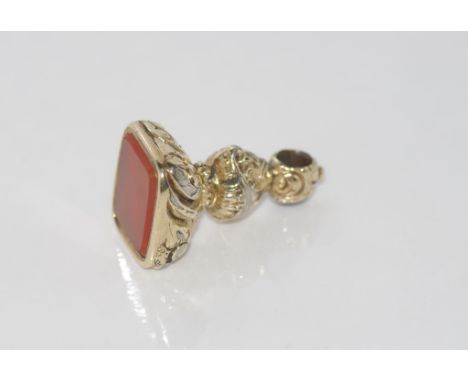 Vintage fob with heavy gold sleeve and carnelian size: approx 2.5cm high