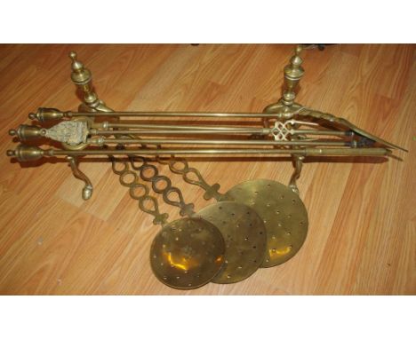 Quantity of brass fire tools, chestnut roasters & a pair of andirons