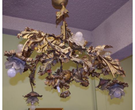 Belgium hand crafted gilt & iron light fitting as inspected, need to be rewired.