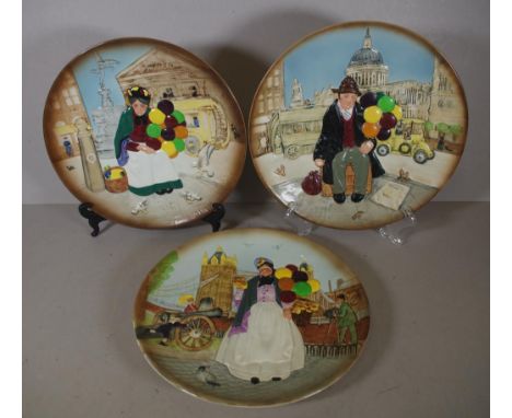 Three various Royal Doulton Balloon seller plates 25.5cm diameter approx.