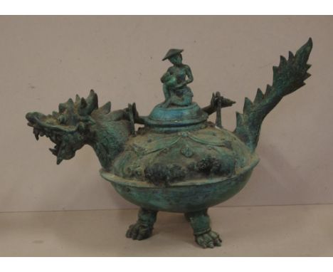 Vintage Chinese cast metal dragon teapot on 3 feet with figural lid, 31cm high