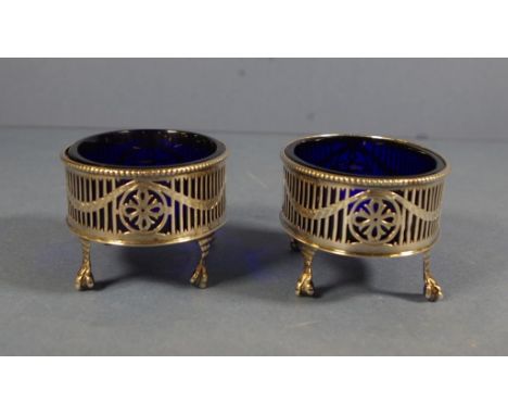 Pair George V HM sterling silver open salts Sheffield 110, makers HE Ltd. Pierced gallery. Monogrammed. With fitted blue glas
