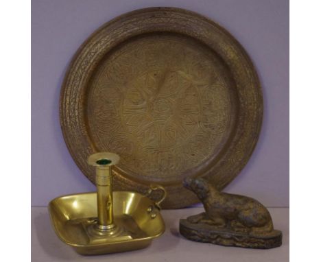 Vintage brass candle holder and tray together with a cast iron dog doorstop