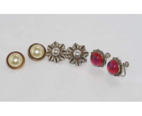 Vintage Mexican silver floral clip earrings together with two other silver pairs of earrings (one clip and one screw)