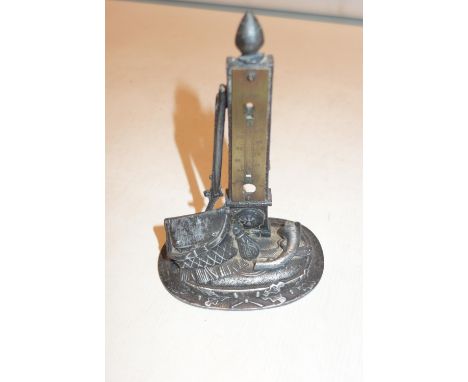 A SPELTER MOUNTED THERMOMETER, (LACKING THERMOMETER 