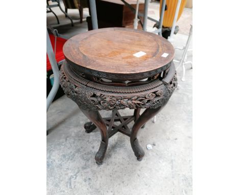 A CHINESE CARVED WOODEN JARDINIERE STAND WITH STAR OF DAVID SHELF DESIGN 