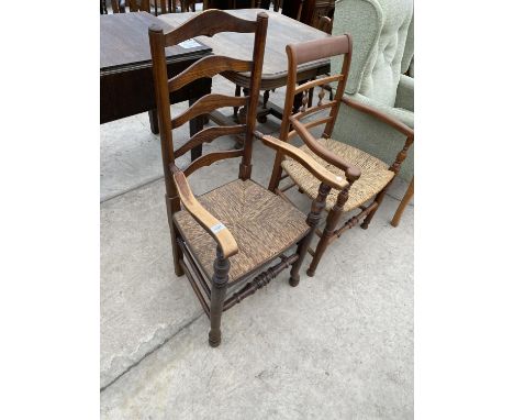 TWO LADDER BACK CARVER DINING CHAIRS WITH RUSH SEATS - ONE OAK, ONE MAHOGANY 