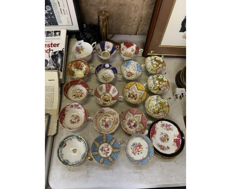 A COLLECTION OF HAND PAINTED CUPS AND SAUCERS 