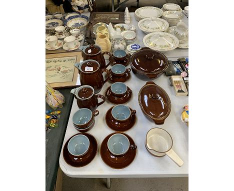 A DENBY TEA SET TO INCLUDE CUPS, SAUCERS AND COFFE POTS TOGETHER WITH TUREENS 