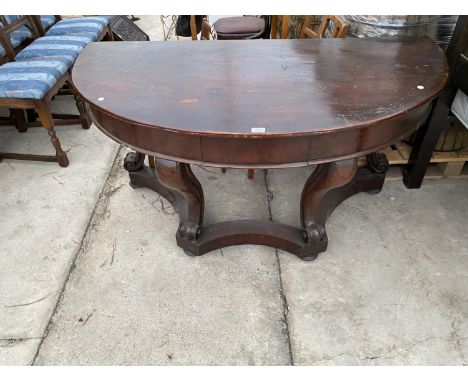 A VICTORIAN CARVED MAHOGANY DEMI LUNE CONSOLE TABLE 