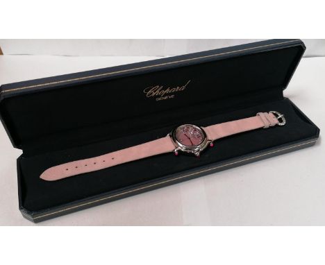 A LADIES BOXED CHOPARD 'FLOATING DIAMONDS' WATCH WITH DIAMONDS AND RUBIES WITH CERTIFICATE FROM WATCHES OF SWITZERLAND 