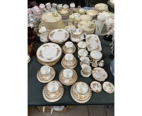 A LARGE TEA SERVICE OF ROYAL ALBERT 'ANTOINETTE' TO INCLUDE CUPS, SAUCERS, SIDE PLATES, JUGS ETC 