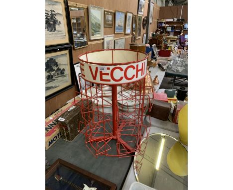 A VINTAGE RED TUBULAR METAL DISPLAY STAND 