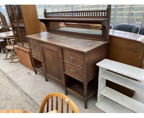 AN OAK SIDEBOARD WITH ONE DOOR, FOUR DRAWERS AND GALLERIED UPPER SHELF 