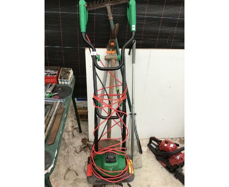 AN ELECTRIC ROTOVATOR IN WORKING ORDER AND VARIOUS GARDEN TOOLS TO INCLUDE A SPADE, FORK, RAKE ETC 
