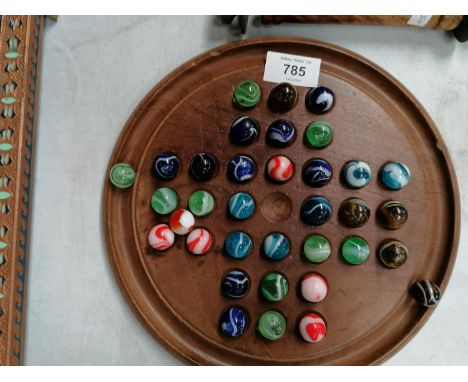 A VINTAGE SOLITAIRE / MARBLES BOARD WITH GLASS MARBLES 