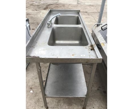 A STAINLESS STEEL DOUBLE SINK UNIT WITH MIXER TAP AND A LOWER SHELF 