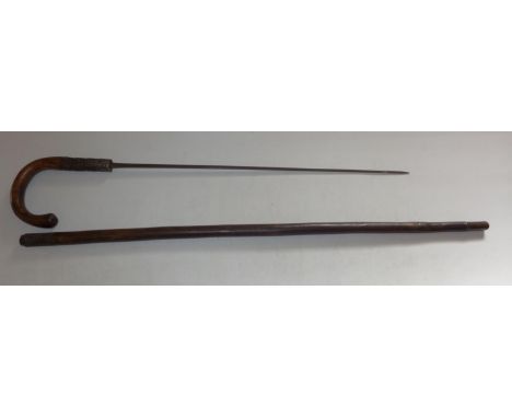 AN ANTIQUE SWORD STICK, LENGTH OF BLADE 55 CM 