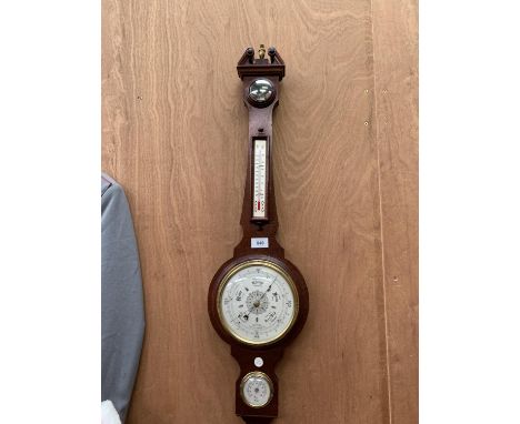 A HUGER PRECISION WOODEN BAROMETER 