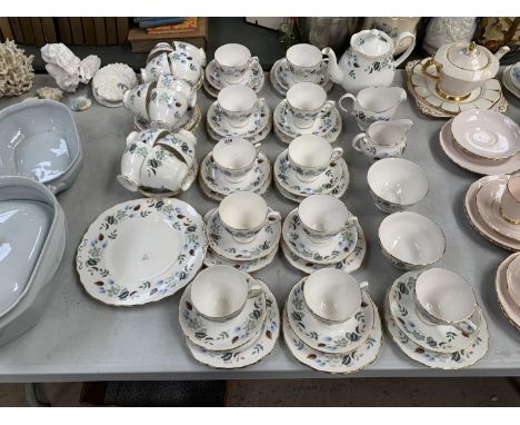 A COLCLOUGH TEA SET COMPRISING OF CUPS, SAUCERS, SIDE PLATES, CREAM JUGS ETC 