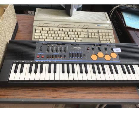 A CASIO KEYBOARD AND AN ATARI 520ST 