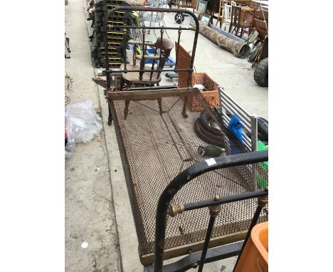 A VINTAGE SINGLE BRASS AND IRON BED 