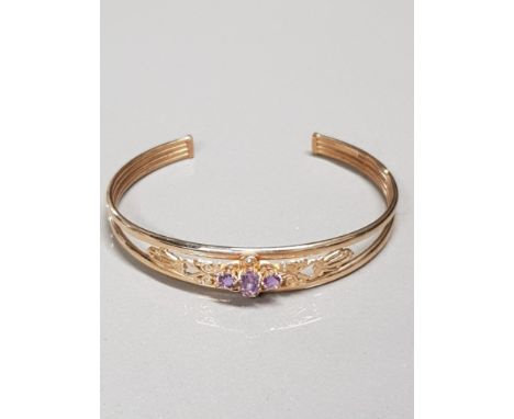 9CT GOLD AMETHYST AND TURQUOISE BANGLE GROSS WEIGHT 6.7G