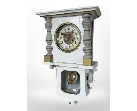An early 20th-century continental painted and gilt 8-day wall clock with enamel dial, height 70cm.