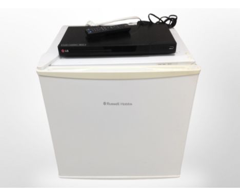 A Russell Hobbs bench-top freezer and an LG DVD player.