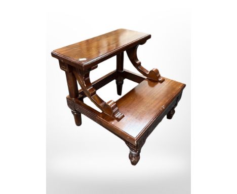 A reproduction mahogany library step, 44cm x 40cm x 40cm.