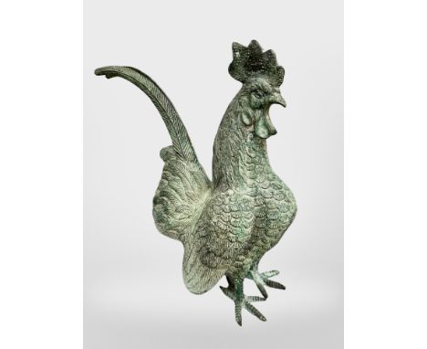 A patinated bronze cockerel figure, height 29 cm.